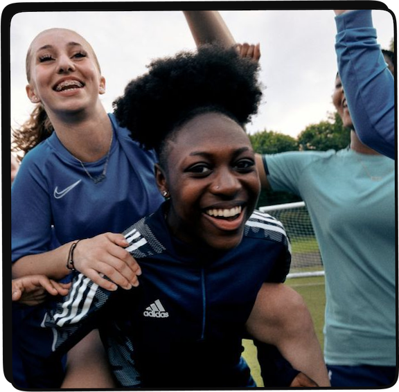 Sports team celebrating together